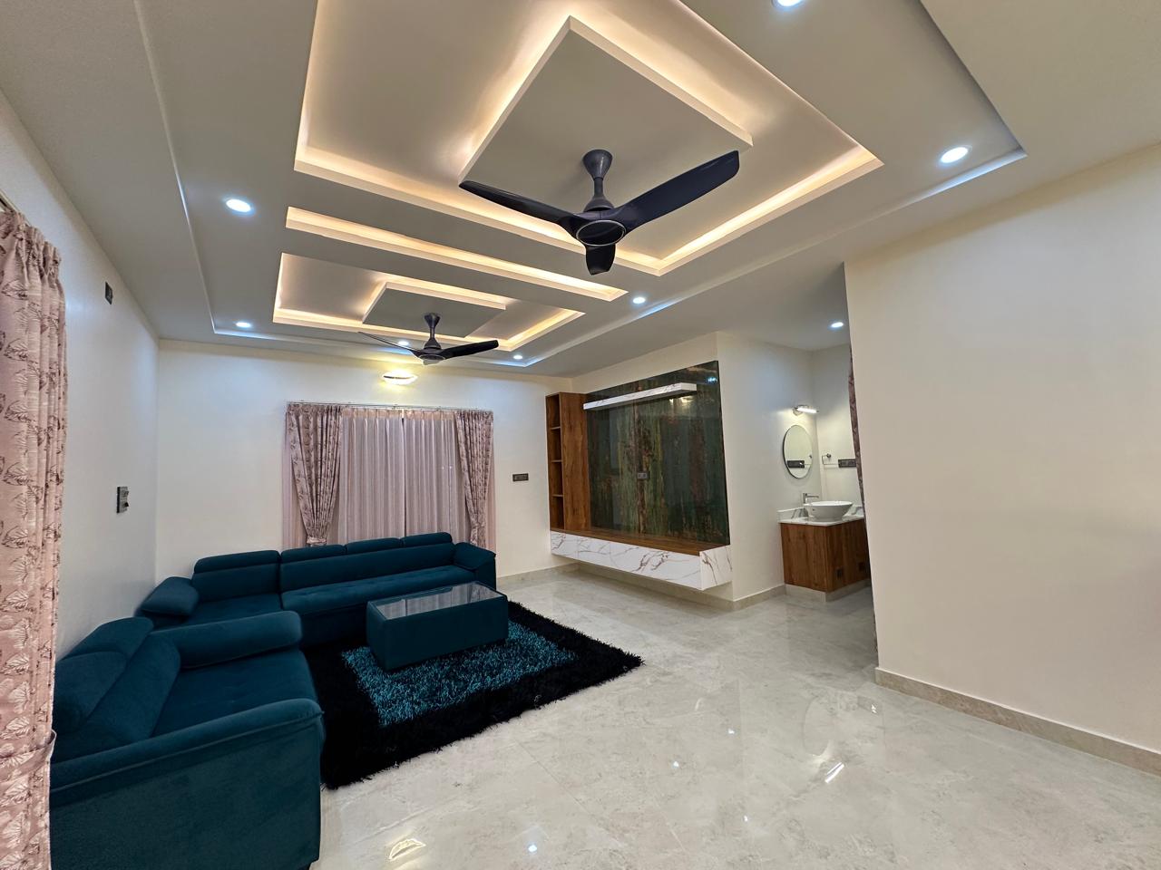 Luxury residential interior design in Bengaluru — bedroom and living area by Shazfan Associates